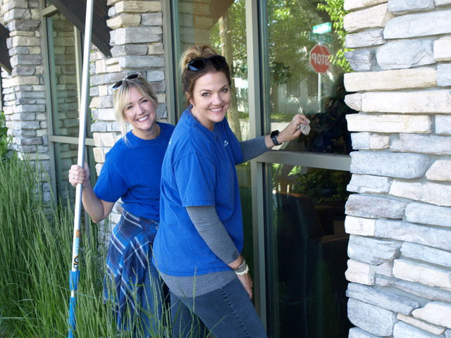 Ladies Washing Windows